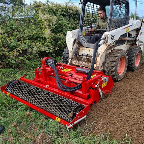 skid steer stoneburrier|stone burier with roller.